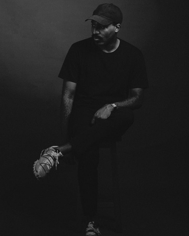 A photo of mixed media artist Dennis Osadebe