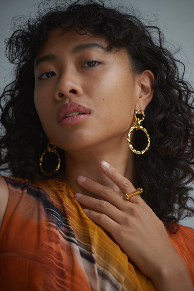 The Edit: 7 Pieces of Statement Jewelry featuring Prizm earrings and Arc ring by Third Crown